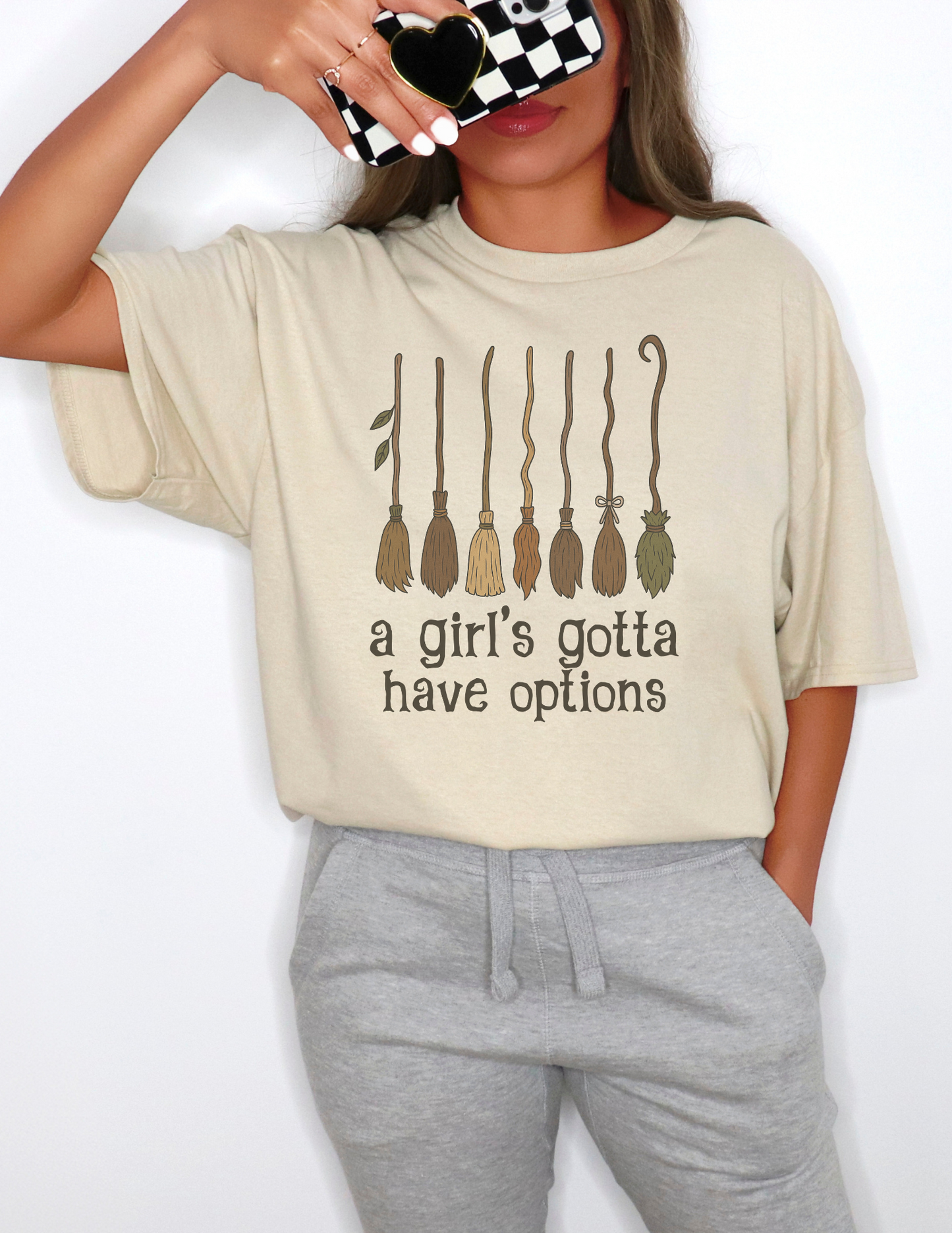 A girl's gotta have options witches brooms graphic