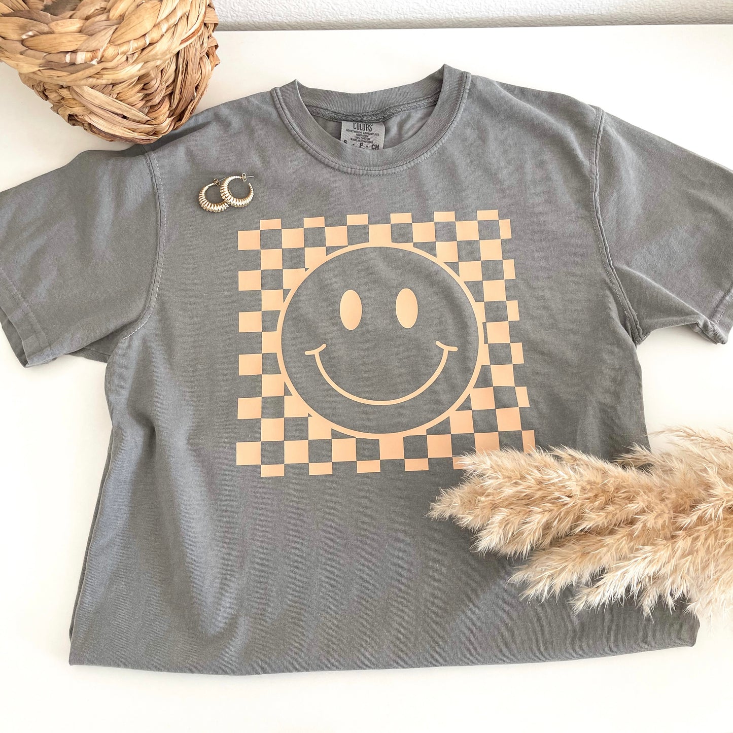 Checkered happy face graphic tee