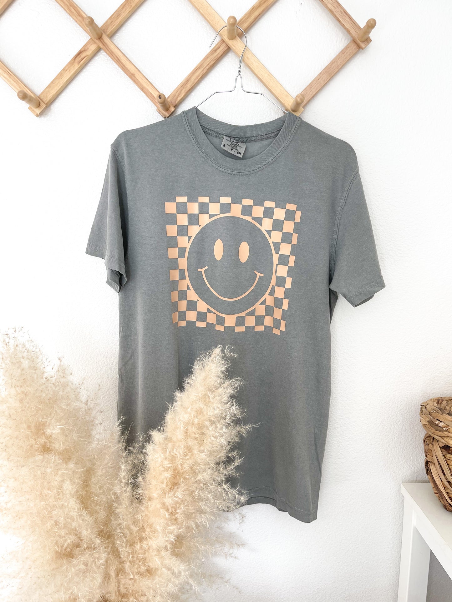 Checkered happy face graphic tee