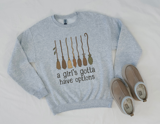 A girl's gotta have options witches brooms graphic
